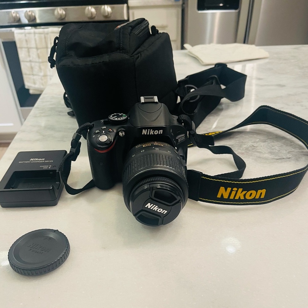 Nikon D5100 Digital SLR Camera 16.2MP HD Video Nikon Lens